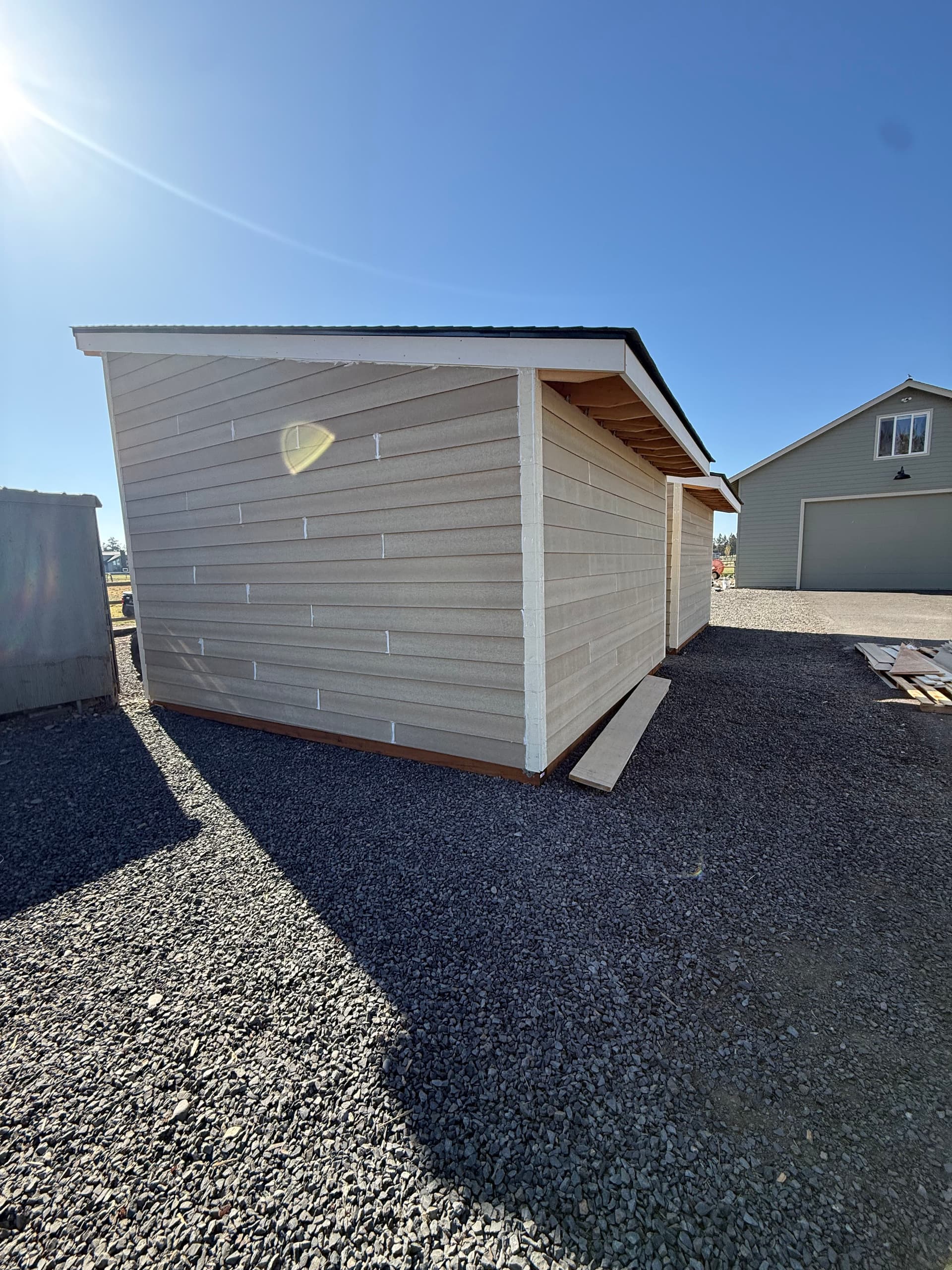 Fresh Siding Installation on a Rural Outbuilding That Needed It