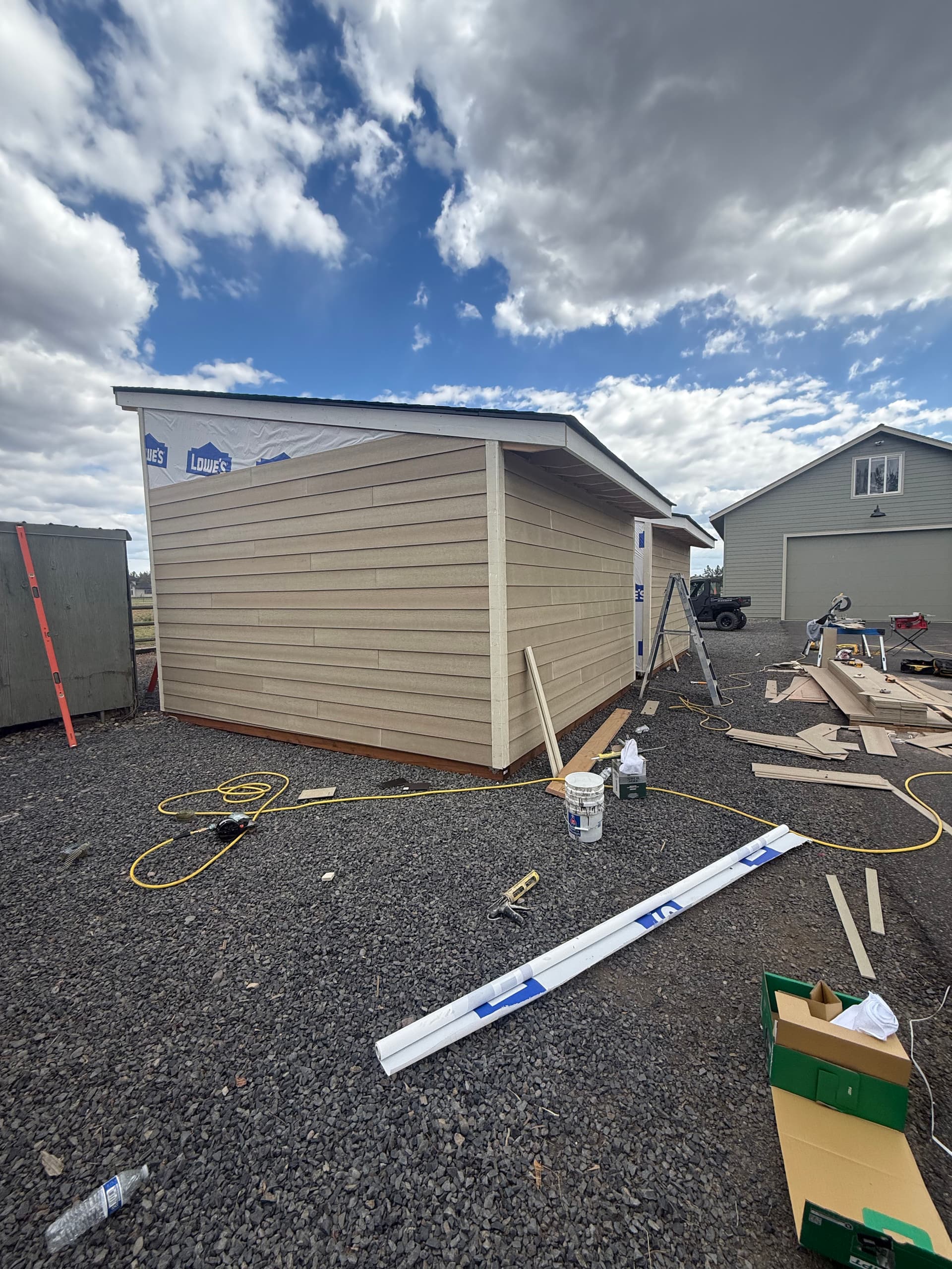 Fresh Siding Installation on a Rural Outbuilding That Needed It