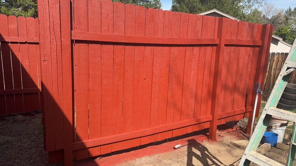 Gallery photos for Wood Fence Repaint With Bold Red in Tetherow: Image #1